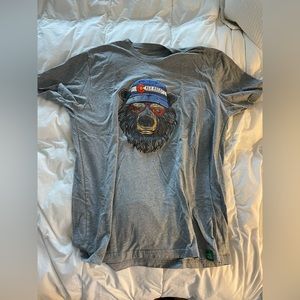 Large red rocks T-shirt with a hippie bear